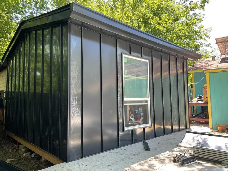 Black standing seam metal wall panels for Metal Roof Installation in Leeds